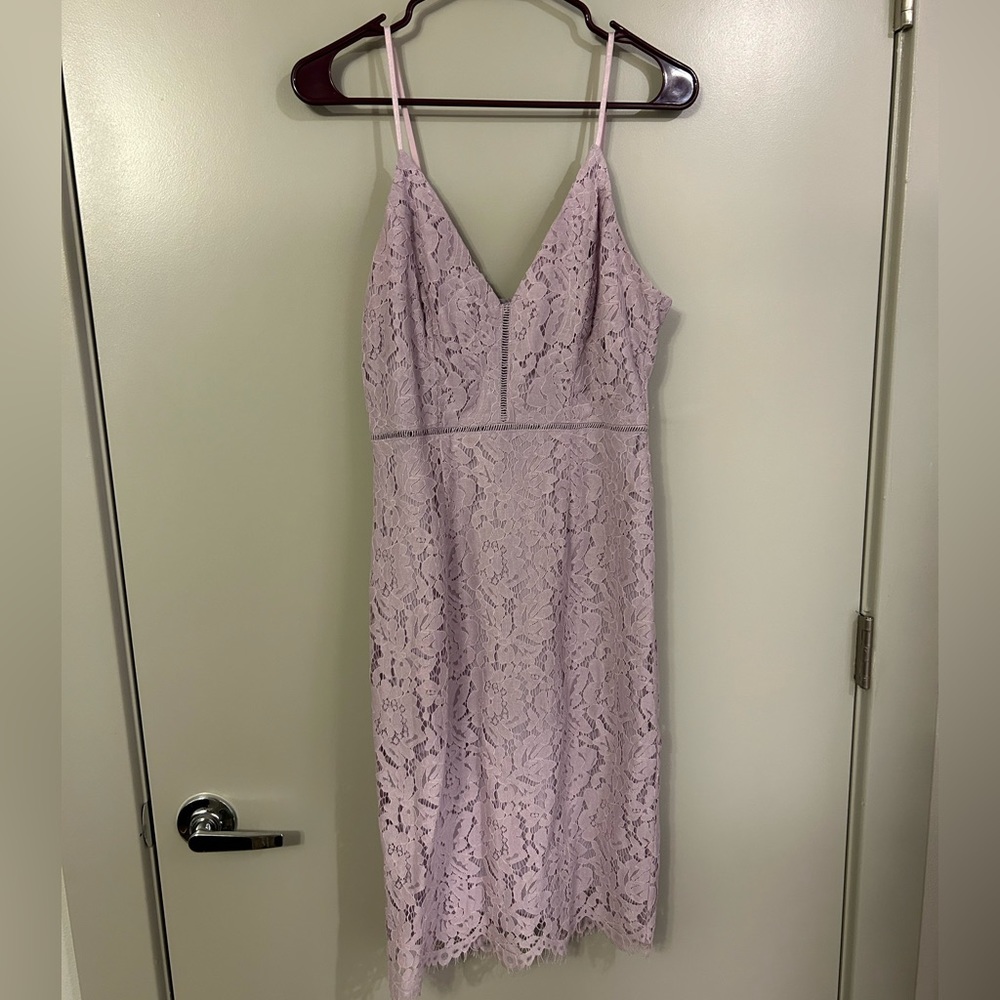 Like new condition, purple size small lacy dress. ASTR the label